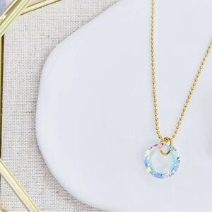 Stainless Steel 18” Necklace with beautiful crystal pendant. Color: Gold